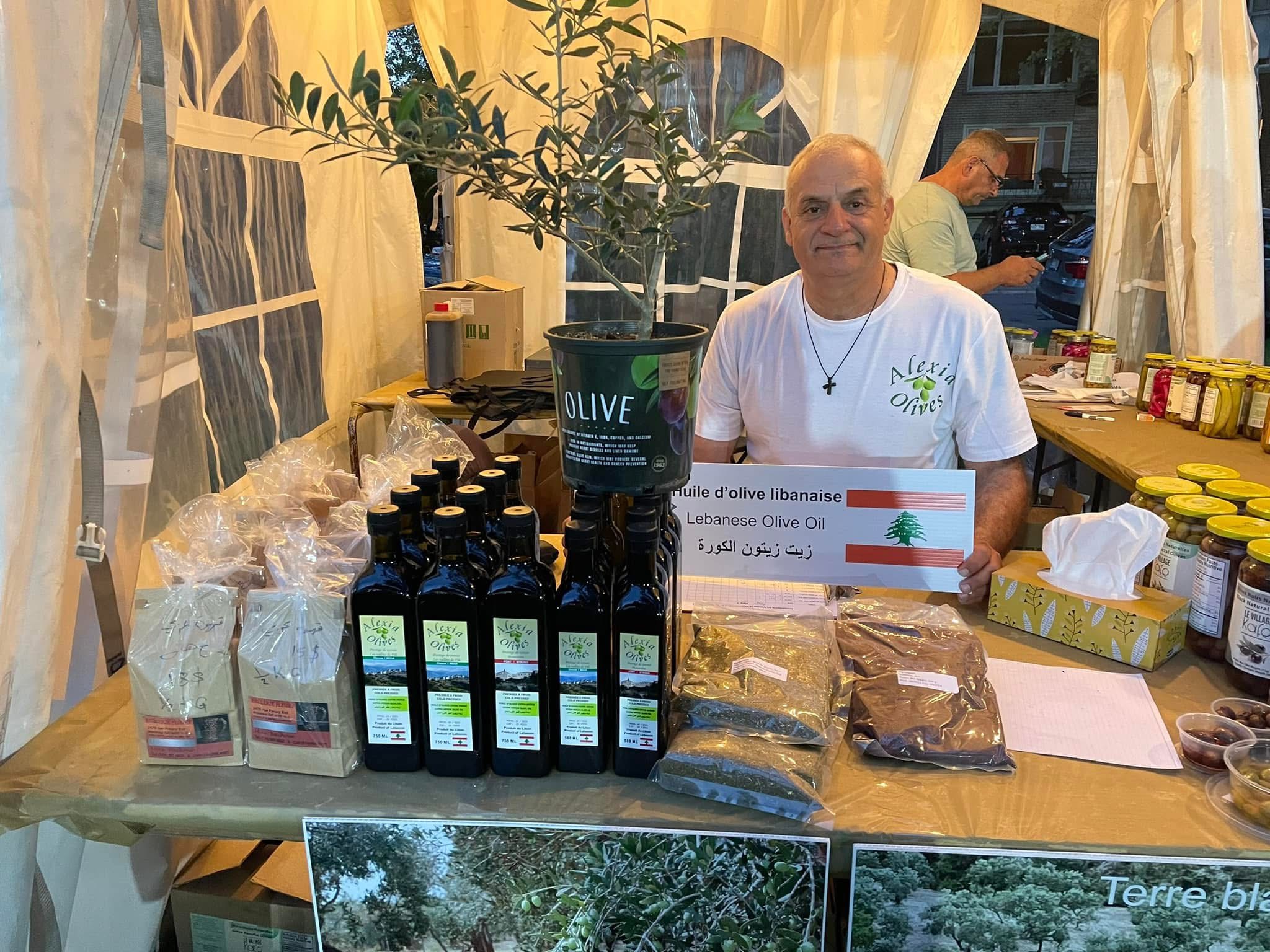 The Alexia Olives market stand with the Lebanese flag